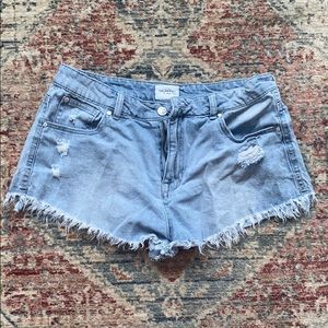 CELEBRITY PINK — distressed denim shorts